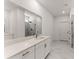 Bathroom with marble tile and a large vanity at 207 Hickory Bluffs Pkwy, Canton, GA 30114