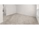 Spacious bedroom with neutral walls and plush carpet ready to be customized at 207 Hickory Bluffs Pkwy, Canton, GA 30114