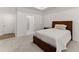 Cozy bedroom with neutral color palette and large bed at 207 Hickory Bluffs Pkwy, Canton, GA 30114