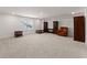 Spacious bonus room featuring plush carpeting and furniture at 207 Hickory Bluffs Pkwy, Canton, GA 30114