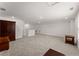 Bright bonus room with neutral walls and plush carpeting ready to be customized at 207 Hickory Bluffs Pkwy, Canton, GA 30114