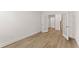 A large living room featuring hardwood floors, french doors, and lots of space at 207 Hickory Bluffs Pkwy, Canton, GA 30114