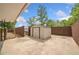Spacious backyard featuring a storage shed, wood fence, and grassy area at 9 Latimer Rd, Cartersville, GA 30121