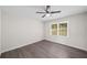 Bedroom with gray wood floors and ceiling fan at 9 Latimer Rd, Cartersville, GA 30121