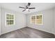 Bedroom featuring two windows and neutral walls at 9 Latimer Rd, Cartersville, GA 30121