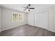 Bedroom featuring a window, fan, and closet at 9 Latimer Rd, Cartersville, GA 30121