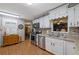 Updated kitchen with stainless steel appliances, sleek countertops, and stylish cabinetry at 1125 Lanier Sw Dr, Marietta, GA 30060