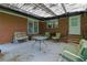 An outdoor patio with plenty of seating, perfect for relaxing and enjoying the backyard views at 1125 Lanier Sw Dr, Marietta, GA 30060