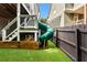 Backyard area featuring artificial grass and a slide at 1626 Gilstrap Nw Ln, Atlanta, GA 30318