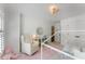 bedroom featuring bright natural light and an armchair at 1626 Gilstrap Nw Ln, Atlanta, GA 30318