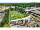 Aerial view of a modern driving range facility with multiple hitting bays and green targets at 1626 Gilstrap Nw Ln, Atlanta, GA 30318
