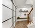 Entryway with brick floors, sliding glass door, and wooden accents at 1626 Gilstrap Nw Ln, Atlanta, GA 30318