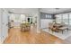 Bright and open-concept kitchen with a large island, white cabinetry, and modern appliances at 1626 Gilstrap Nw Ln, Atlanta, GA 30318