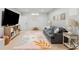 Cozy living room with shiplap accent wall and play area at 1626 Gilstrap Nw Ln, Atlanta, GA 30318