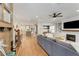 Open-concept living room with hardwood floors, fireplace, and plenty of natural light at 1626 Gilstrap Nw Ln, Atlanta, GA 30318