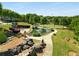 Scenic community pond with a fountain, walking paths, rock features, and lush landscaping for peaceful enjoyment at 1626 Gilstrap Nw Ln, Atlanta, GA 30318