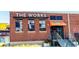 Exterior of The Works building with brick facade and prominent signage at 1626 Gilstrap Nw Ln, Atlanta, GA 30318