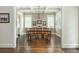 Bright and spacious dining room with coffered ceilings, large windows, and a stylish chandelier at 172 Olympic Pl, Decatur, GA 30030