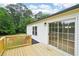 New back porch with sliding glass doors overlooking the backyard at 1960 W Hightower Trl, Conyers, GA 30012
