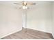 Comfortable bedroom features wood-look floors, and a ceiling fan; the perfect space for relaxation at 1960 W Hightower Trl, Conyers, GA 30012