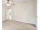 Bedroom featuring neutral walls, carpet, and a view to another room at 1960 W Hightower Trl, Conyers, GA 30012