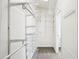 Walk-in closet with functional white wire shelving, optimizing storage, and easy organization at 1960 W Hightower Trl, Conyers, GA 30012