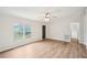 Bright living room with wood flooring, access to the yard, and neutral walls at 1960 W Hightower Trl, Conyers, GA 30012