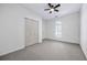 Bedroom with carpet flooring, ceiling fan and natural light at 1965 Tiner Ct, Cumming, GA 30041