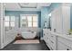 Bathroom with a freestanding tub, glass shower, double vanity, and tile floors at 2208 Sage Mountain Sw Ct, Marietta, GA 30064