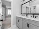 Contemporary bathroom with dual sinks, modern fixtures, and a spacious feel at 2208 Sage Mountain Sw Ct, Marietta, GA 30064