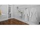 Walk-in closet with built-in shelving and hanging rods at 2208 Sage Mountain Sw Ct, Marietta, GA 30064