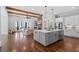 Open concept kitchen with a large center island, stainless appliances, and hardwood floors at 2208 Sage Mountain Sw Ct, Marietta, GA 30064
