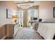 Bedroom with an exposed ceiling, a comfortable bed, with a work space, bathed in natural light at 890 Memorial Se Dr # 102, Atlanta, GA 30316