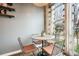 Cozy dining area with a round table, seating for four, natural light, and stylish decor at 890 Memorial Se Dr # 102, Atlanta, GA 30316