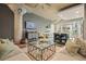 Spacious living room showcasing modern decor, a large window, a comfortable sofa, and an open layout at 890 Memorial Se Dr # 102, Atlanta, GA 30316