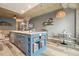 Open-concept living space with a kitchen island, dining area, and view of the modern interior design at 890 Memorial Se Dr # 102, Atlanta, GA 30316
