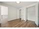 Bright bedroom features hardwood floors, spacious closets, and neutral paint at 2200 Carlton Ct # 6, Atlanta, GA 30318