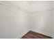 Walk-in closet with wood flooring and wire shelving at 2200 Carlton Ct # 6, Atlanta, GA 30318