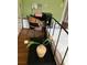 Bedroom with hardwood floors, bed, and a vase of tulips on the nightstand at 2477 N Decatur Rd # A1, Decatur, GA 30033