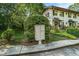 Mailboxes surrounded by trees and bushes, with townhomes in the background at 2477 N Decatur Rd # A1, Decatur, GA 30033