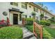 Charming townhouse with a brick facade, black shutters, and landscaped front yard at 2477 N Decatur Rd # A1, Decatur, GA 30033