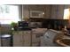 Classic kitchen with white cabinetry, modern appliances and a bright window over the sink at 2477 N Decatur Rd # A1, Decatur, GA 30033