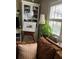 Comfortable living room with a plush couch, cabinet, and bright window at 2477 N Decatur Rd # A1, Decatur, GA 30033