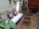 Outdoor patio featuring comfortable seating, a table, and natural greenery at 2477 N Decatur Rd # A1, Decatur, GA 30033