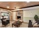 Cozy basement featuring stone accents and a fireplace at 975 Timber Lake Trl, Cumming, GA 30041