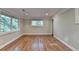 Bright bedroom with hardwood flooring and great natural light at 975 Timber Lake Trl, Cumming, GA 30041