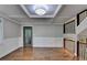 Bright living room featuring hardwood floors and staircase at 975 Timber Lake Trl, Cumming, GA 30041