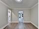 Inviting living room boasts hardwood floors and neutral colors, creating a warm and welcoming atmosphere at 975 Timber Lake Trl, Cumming, GA 30041