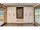 Mud room features built-in storage cabinets, bench, and brick backsplash at 975 Timber Lake Trl, Cumming, GA 30041