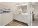 Bright bathroom featuring double vanity, white cabinets, and attractive decor at 1337 Magnolia Bend Way # 289, Jonesboro, GA 30238